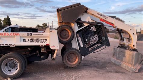 how to load a skid steer without ramps|heavy duty commercial truck ramps.